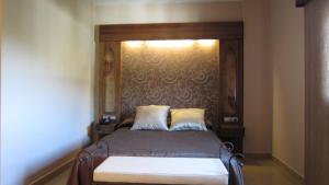 Posteľ alebo postele v izbe v ubytovaní Hotel La Brasa