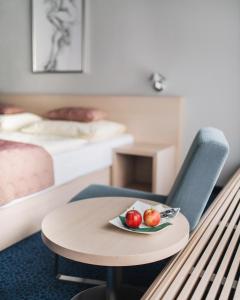 Llit o llits en una habitació de Hotel Split