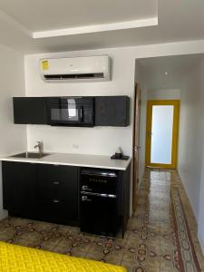 Kuchyň nebo kuchyňský kout v ubytování Hotel Nest
