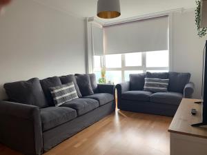 A seating area at OKTHEWAY Castelao Street