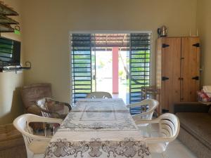 Χώρος καθιστικού στο Casa de veraneio perto do mar