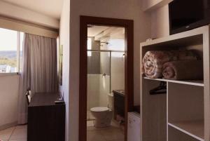 Koupelna v ubytování Hotel Comoditá Ltda