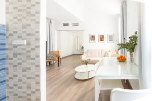 Χώρος καθιστικού στο Apartamentos con encanto en el centro de Granada