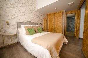 Apartamentos con encanto en el centro de Granada客房内的一张或多张床位