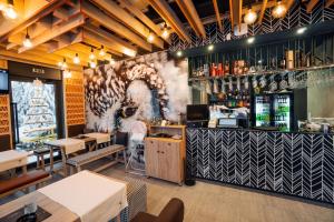 Ο χώρος του lounge ή του μπαρ στο FORRESTO APARTMANI JAHORINA