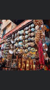 a store with a lot of different items on display at B&B Ruffo Nel cuore di Napoli in Naples