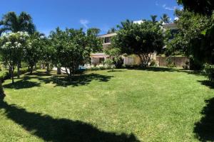 Um jardim no exterior de Suite totalement équipée avec vue imprenable!!!!