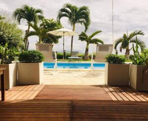 A piscina em ou perto de Suite totalement équipée avec vue imprenable!!!!