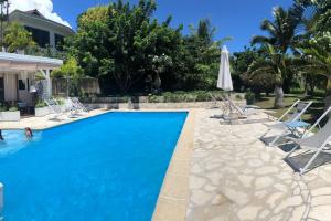 A piscina em ou perto de Suite totalement équipée avec vue imprenable!!!!