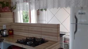 Køkken eller tekøkken på Ingleses norte da ilha + 2 billeder