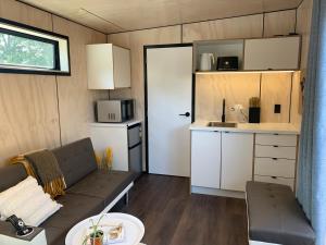 Köök või kööginurk majutusasutuses Snowman Cabins