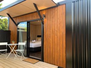Voodi või voodid majutusasutuse Snowman Cabins toas