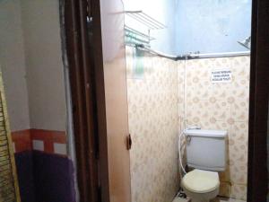 Koupelna v ubytování Hotel Alifah 1 Syariah