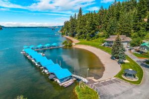 an aerial view of a dock on a lake at Kidd Island Bay Cabin Retreat in Coeur d'Alene