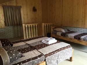 Postel nebo postele na pokoji v ubytování Cottages in mountains