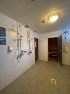 a room with pipes on the wall of a building at Karemajat Cottage Resort in Ylitornio