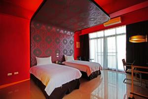 Uma cama ou camas num quarto em Fun Trip - Little Castle & Oscar B&B