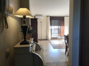 TV a/nebo společenská místnost v ubytování Apartamento Playa Verde + 15 fotografií