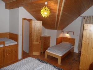 Posteľ alebo postele v izbe v ubytovaní Tatralandia Apartman 323