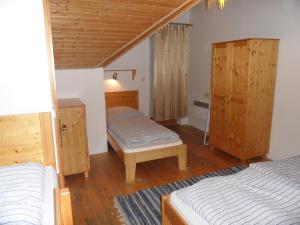 Postel nebo postele na pokoji v ubytování Tatralandia Apartman 323 + 48 fotografií