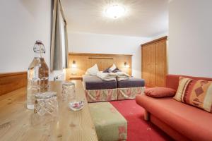 Posedenie v ubytovaní Apart Garni Enzian