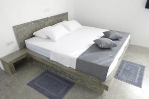 Кровать или кровати в номере Sudu Guest