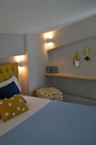 Posteľ alebo postele v izbe v ubytovaní kastro luxury studios and mezonette