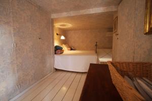 A bed or beds in a room at Residenza Maggiore With Panoramic View
