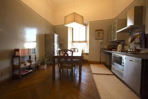 A kitchen or kitchenette at Residenza Maggiore With Panoramic View