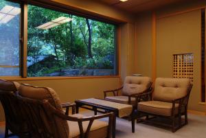 Area soggiorno di Kinosaki Onsen Nishimuraya Hotel Shogetsutei