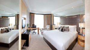 Postel nebo postele na pokoji v ubytování Dorsett Grand Subang Hotel