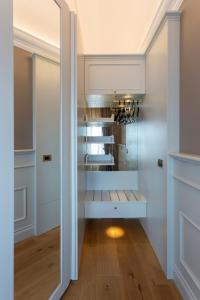 A kitchen or kitchenette at Boutique Hotel Villa Zoppi - Adults only