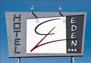 Um certificado, prêmio, placa ou outro documento exibido em Eden Hotel