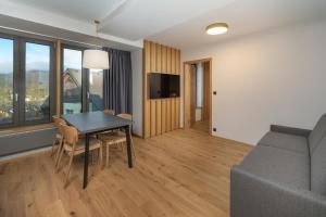 TV a/nebo společenská místnost v ubytování Palace Apartments