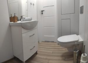 Kupatilo u objektu Bolek Lolek Domki Apartamenty