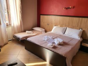 Postel nebo postele na pokoji v ubytování B&B 13