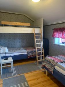 Una cama o camas en una habitación de Chinova Mötesgård i Järvsö