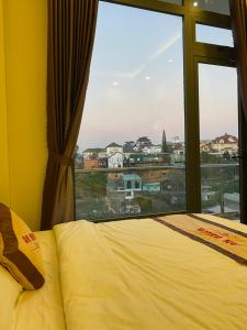 Postel nebo postele na pokoji v ubytování An Nhien Hotel