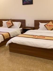 Postel nebo postele na pokoji v ubytování An Nhien Hotel