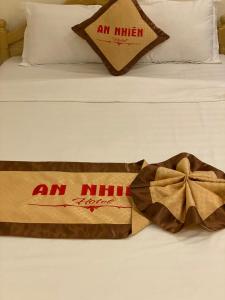 Postel nebo postele na pokoji v ubytování An Nhien Hotel