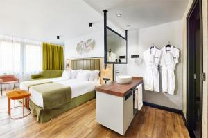 Postel nebo postele na pokoji v ubytování Barceló Budapest