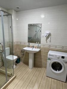 Ванна кімната в Orient INN Apartment