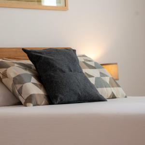 מיטה או מיטות בחדר ב-Stilla Ristorante e Camere