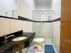 Ein Badezimmer in der Unterkunft Hotel Estação de Minas