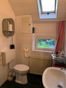 Koupelna v ubytování Vintage Apartment Hase