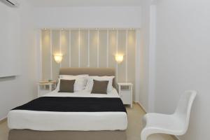 Posteľ alebo postele v izbe v ubytovaní Romantica Suites