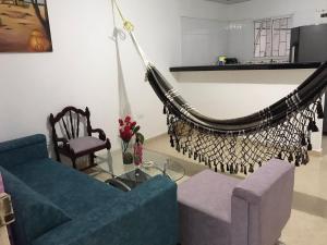 Ruang duduk di Apartamento Cómodo