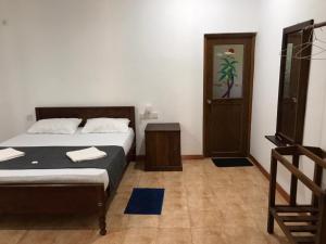 Letto o letti in una camera di Miyonra - Anuradhapura