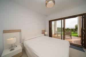A bed or beds in a room at Linara Még 37 kép