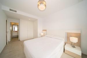 A bed or beds in a room at Linara